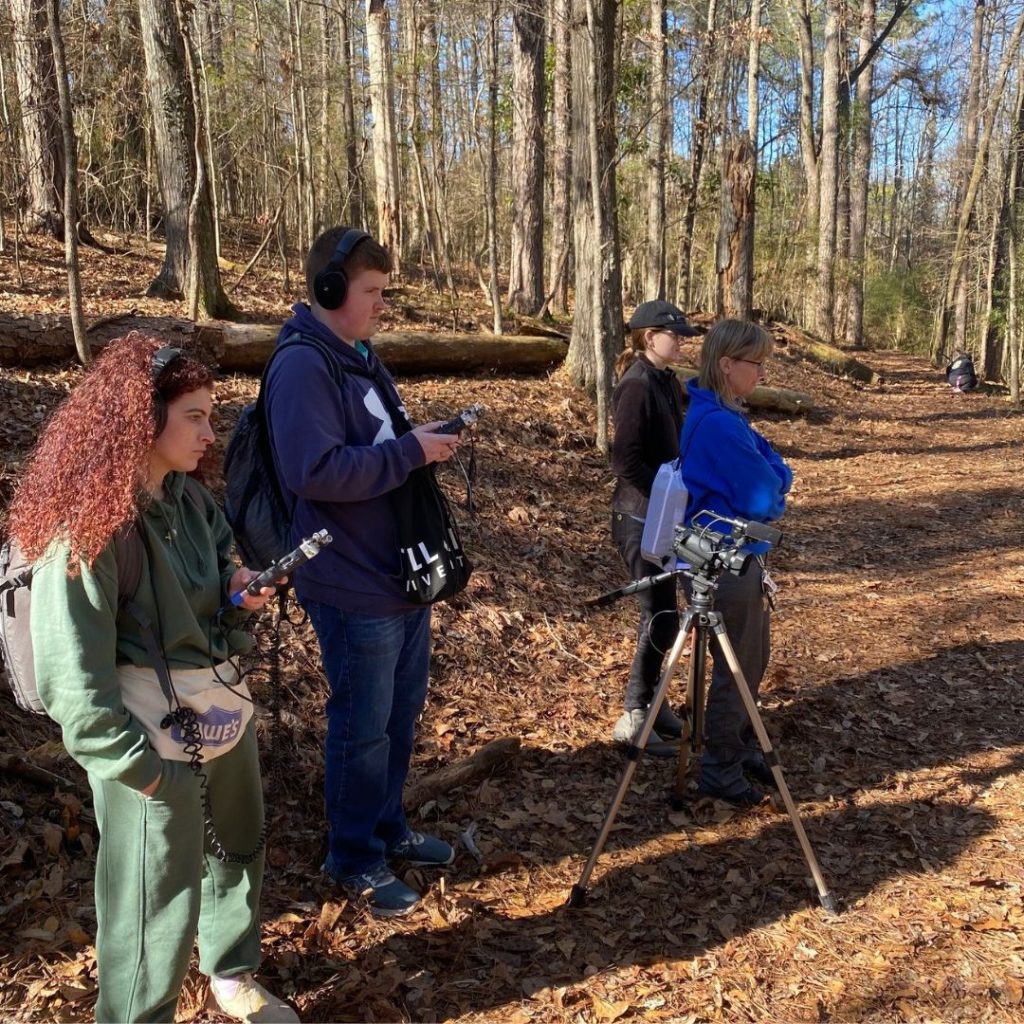 The crew filming a scene. 