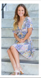 A person sitting on a set of stairs