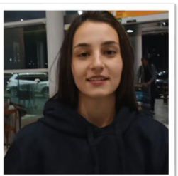 A person smiling at the camera