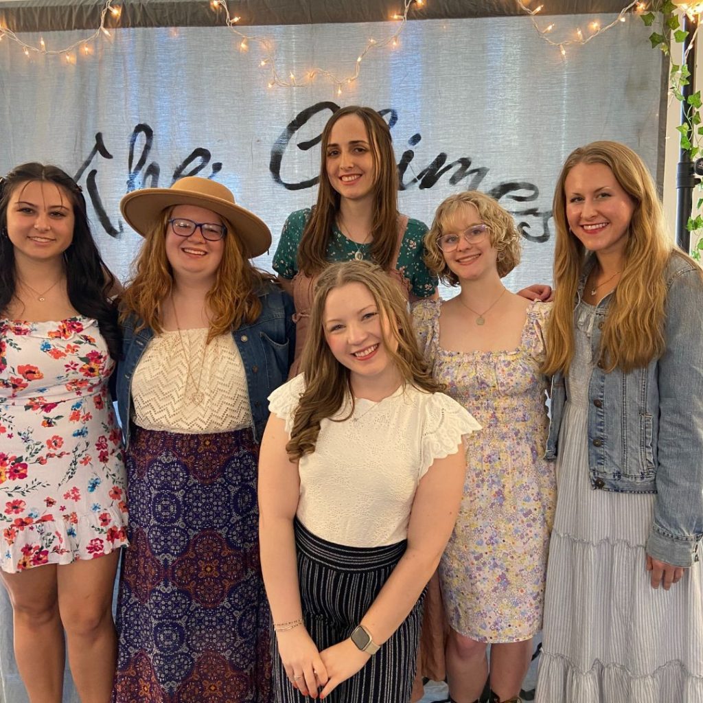 The Chimes staff smiling at the camera