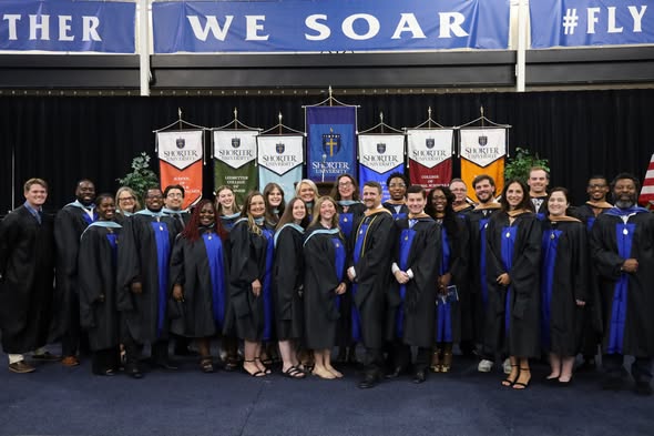 group of students in graduation robes