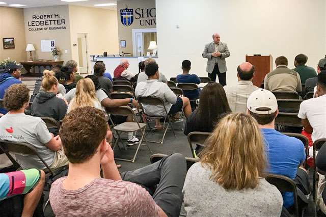 Steve Plunkett speaks to students at Shorter.