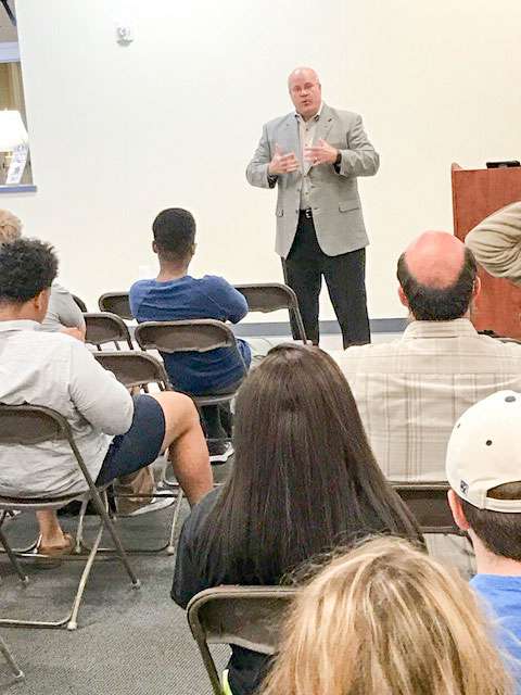 Steve Plunkett speaks to students at Shorter. 